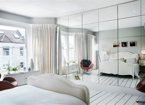 Mirrors can be heavy, and no one wants the risk being injured while having a mirror fall on them. Wall of mirrored closets, wardrobes, storage. Reflects the ...