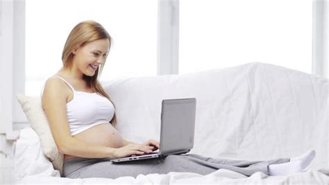 Pregnant Woman Lying Naked On Bed Stock Footage Video