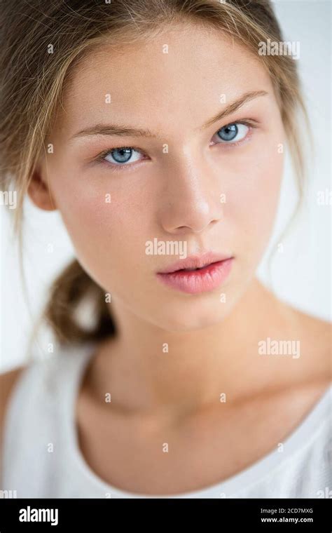 Woman Without Makeup Beautiful Pleasant Face Blonde Hair Pulled Back