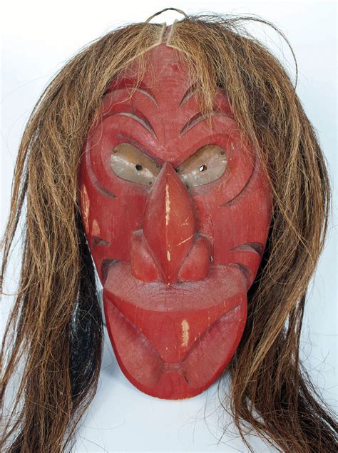 Face coverings and masks reduce the spread of coronavirus droplets from coughs, sneezes and speaking. Iroquois false face mask - Masks of the World