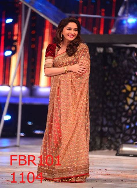 Fabboom Madhuri Dixit In Cream And Maroon Netted Saree Rs 3030