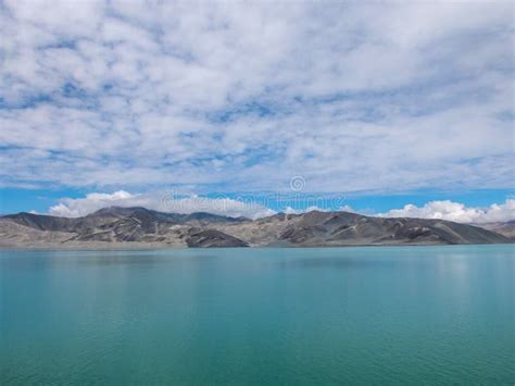 Beautiful Scenery Of Turquoise Blue Lake And Snow Capped Mountains