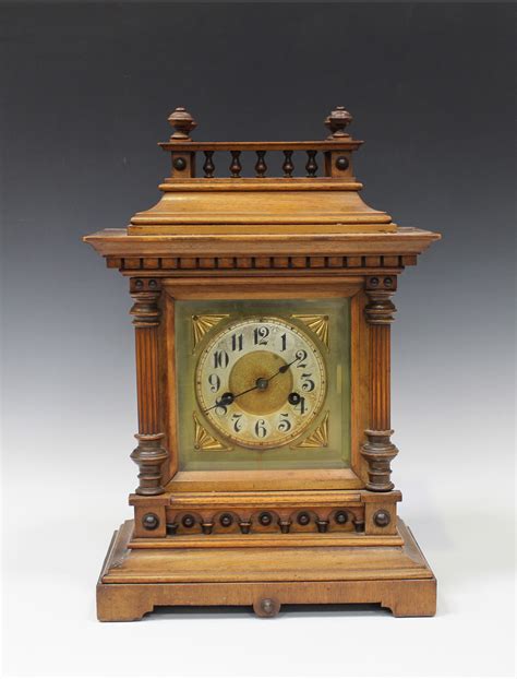 A Late 19th Century German Walnut Mantel Clock With 14 Day Movement Striking On A Gong The Backplat