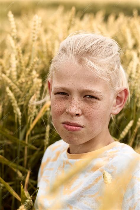 Premium Photo A Blond Boy With Freckles Freckles Portrait Of A Boy