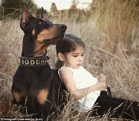 Cutie And The Beast Instagram Account Follows A Girl And Her Dobermans