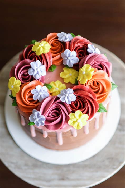So whether chocolate cake is your thing or you want to add some colour to a tray of basic cupcakes, you can let your imagination and creativity take the lead. #cake #buttercream #roses #buttercreamroses #party # ...