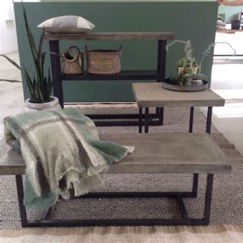 This coffee table makes a modern statement indoors or in protected outdoor spaces. concrete coffee table by peastyle | notonthehighstreet.com