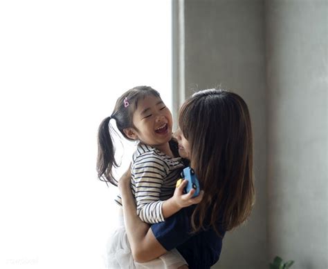 Cheerful Japanese Mother And Daughter Premium Image By