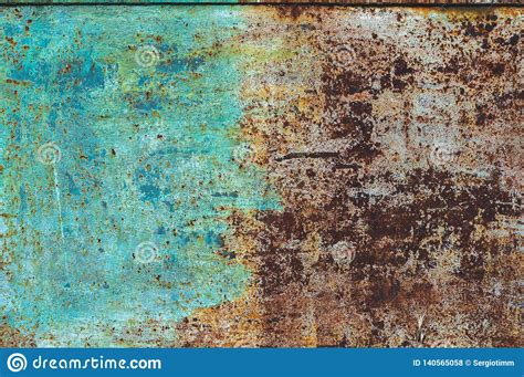 Background From An Old Rusty Sheet Of Metal With Faded Rough Shabby