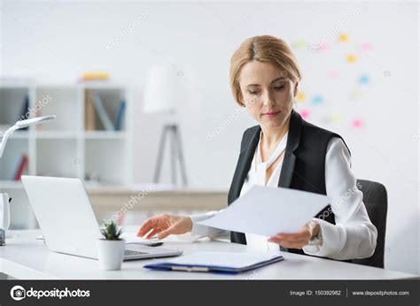 Businesswoman Using Laptop Stock Photo By ©andreybezuglov 150392982