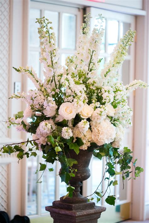 Boston Wedding at the Four Seasons | Church flower arrangements, Flower