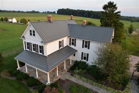 I'm particularly drawn to a classic white farmhouse with metal roof. Old-World Charm: New Metal Roof and Detailing Highlight ...