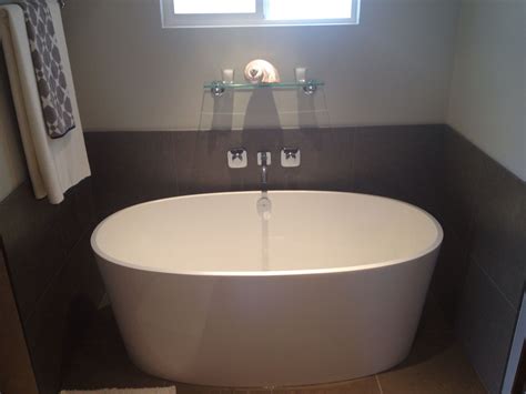 This small bathtub boasts an impressive 16.75 inches of soaking depth. Deep 5 ft soaking tub. | Bathroom | Pinterest | Tubs