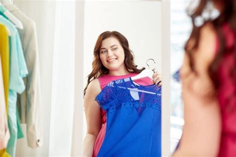 Happy Plus Size Woman With Dress At Mirror Stock Image Everypixel