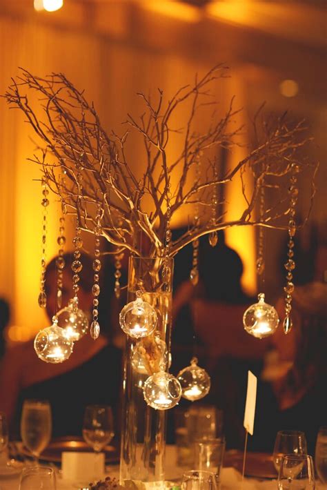 Hanging Tea Light And Gold Branch Centerpieces
