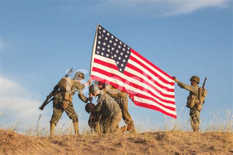 Soldiers Raising The Us Flag Stock Photo Royalty Free Freeimages