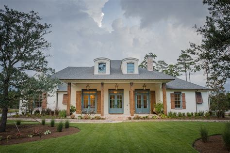 This 3175 sq ft house plan has exceptional curb appeal and offers 4 a french country or acadian style house plan with a one story floor plan and 1852 feet of heated living space. Project Reveal: French Acadian Exterior | French country ...