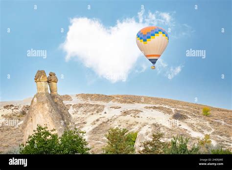 Flying Hot Air Balloons And Fairy Chimneys In Pasabag Valley Or Monks