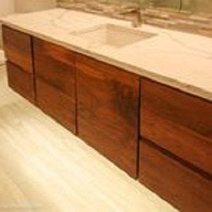 We design, build and install custom bathroom vanities throughout florida. Custom Floating Walnut Vanity by Weber Wood Designs | CustomMade.com