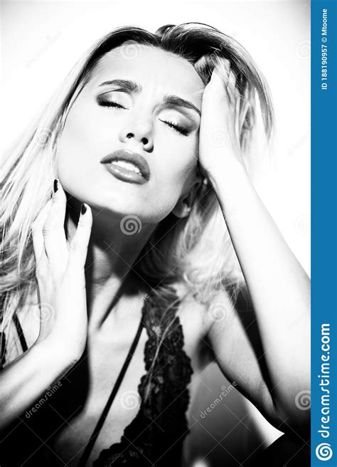 emotions and feelings concept beautiful blond lady portrait in lingerie while getting an