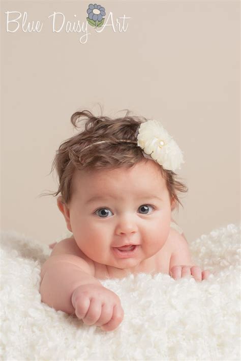 At 3 months old, your baby may have chubbier cheeks and personality galore! 3 month old 4 month old portrait photography www ...
