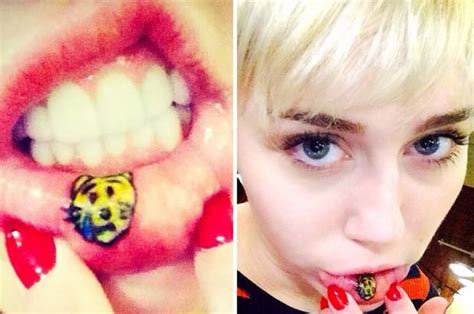 Miley Cyrus Gets Sad Kitty Tattoo On Her Lip Daily Star