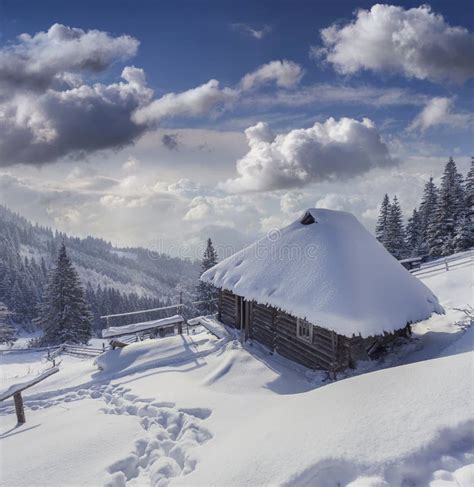 Mountain Hut Covered With Snow In Beautiful Sunshine Day Stock Image