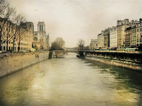 Maybe you would like to learn more about one of these? The River Seine And Saint-michel Bridge Photograph by ...