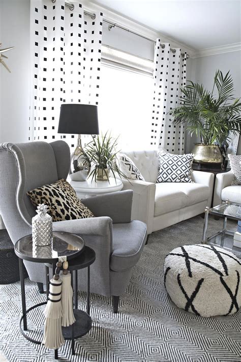 Neutral And Eclectic Living Room With Lots Of Black And White Accents