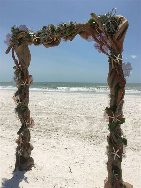 Driftwood Wedding Arch At The Laplaya Resort In Naples Florida