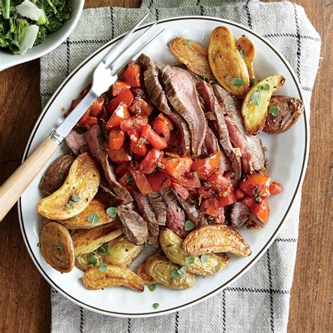 Almost everyones dinner consists of some kind of meat and veg. Steak and Tomatoes with Herb-Roasted Potatoes Recipe ...