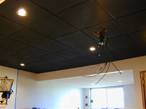 Because a concealed grid suspended ceiling uses interlocking panels to eliminate the look of a metal grid, you'll need to remove the key panel in. 7 Inspiring Basement Ceiling Ideas | Black ceiling tiles ...