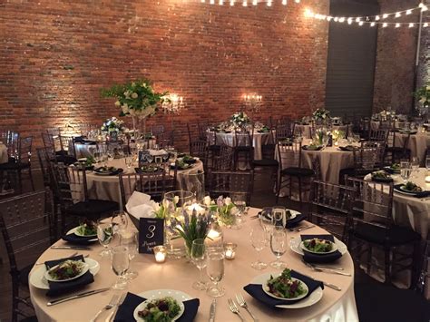 Maybe you would like to learn more about one of these? The navy blue & champagne colors for the table settings ...