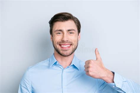Close Up Portrait Of Happy Confident Smiling Employee Showing Th Stock