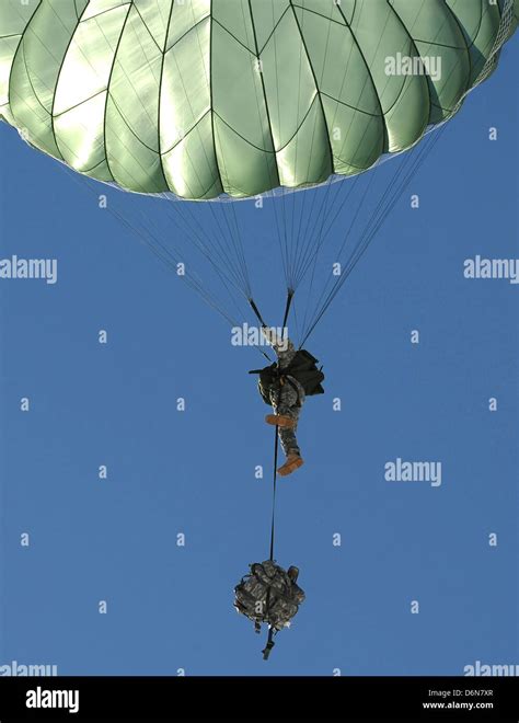 Us Army Paratrooper Soldiers Parachute During An Airdrop Exercise April