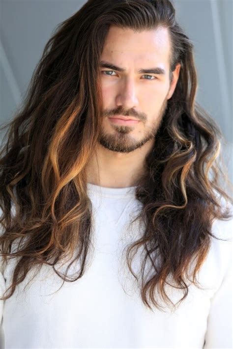 I recommend this style for guys or girls with waves or curls for a low maintenance surfer look. 34 Masculine Long Hair And Beard Styles For Men - Macho Styles