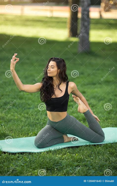 Woman Practicing Yoga Outdoors In Park Stock Image Image Of Health Park 128401643
