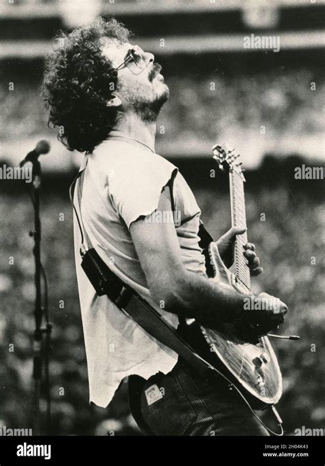 Mexican American Singer And Songwriter Carlos Santana During A Concert