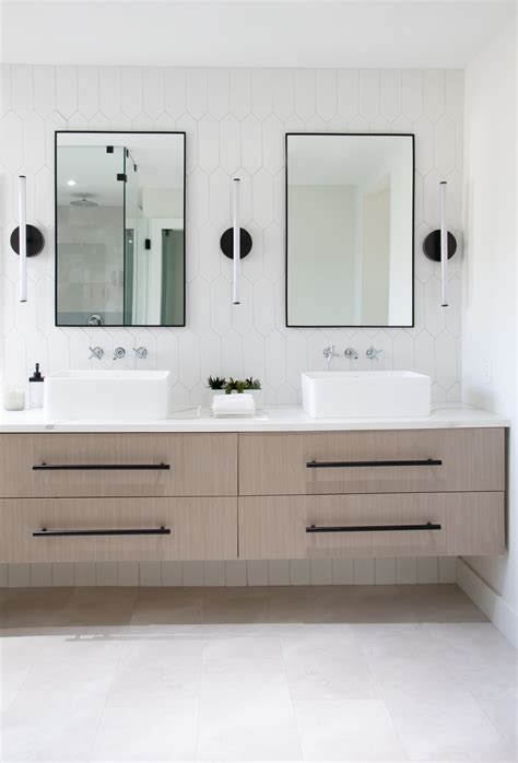 Modern Master Bathroom With Floating Vanity And Black Hardware Designed
