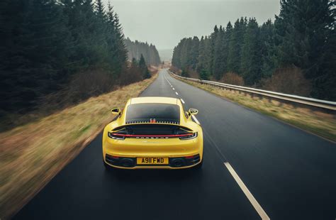 Download Yellow Car Car Porsche Porsche 911 Porsche 911 Carrera 4s