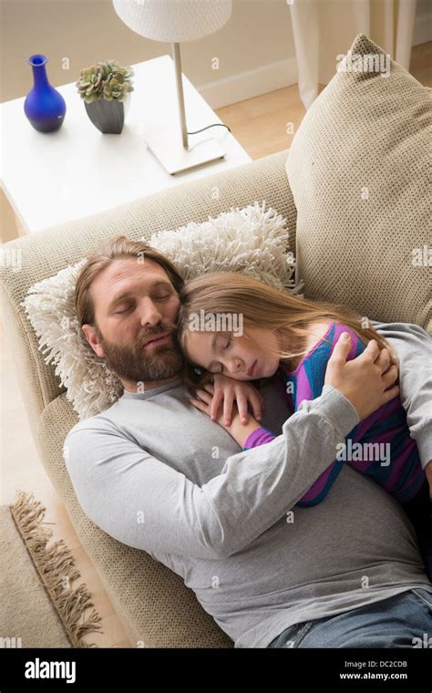 Father And Daughter Sleeping On Couch Stock Photo 59060663 Alamy