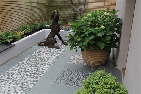 Pebble Mosaic Courtyard With Raised Planters City Garden Courtyard