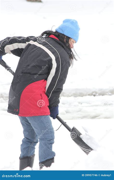 Lady Shoveling Snow From Driveway Stock Photo Image Of Snow Woman