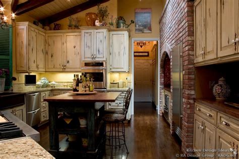 French Country Kitchen With Antique Island Cabinets And Decor