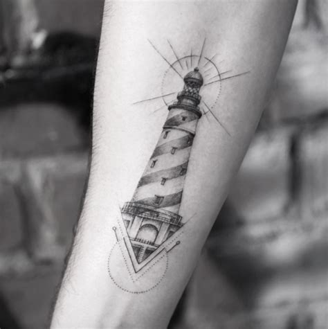 A simple tattoo relies on a basic design, little extra detail, and not much shading or color used in support of the central design. 40+ Incredible Lighthouse Tattoo Designs - TattooBlend