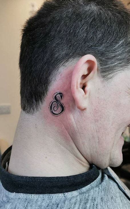 Music Note Behind The Ear Tattoo