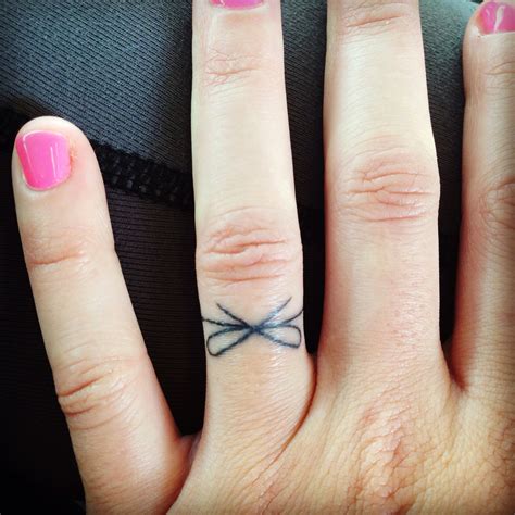 Here's everything you need to know about wedding ring tattoos (plus 40 pictures of ring finger tats to inspire your own ink band!). Pretty, unique, wedding ring tattoo | Wedding ring tattoo ...