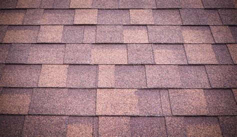 Roof Of Brown Shingles Background And Texture Vignette Stock Photo