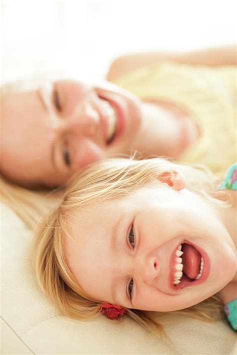 Mother And Her Daughter Laughing Photograph By Ian Hooton Fine Art My