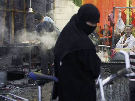 china approve ban on the burqa in xinjiang city with large muslim population the independent